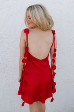 open back red dress with rose drape 