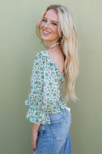 blue and green floral puff sleeve top