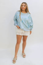 cute everyday back to school outfit white skorts sweatshirt