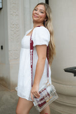 white outfit with crimson red ou boomer sooner accessories