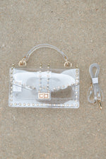 Clear stadium approved crossbody bag with diamond studded game day essentials 