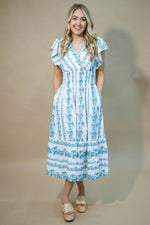 Blue daisy print midi dress with pockets