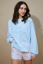 Powder blue embroidered bow sweatshirt