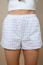 White floral bow print cotton shorts