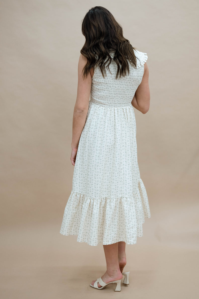 Vintage-inspired floral midi dress with statement collar