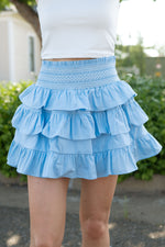 light baby blue ruffle tiered smocked waist with white stitches tier skort skirt cute summer rush bottoms