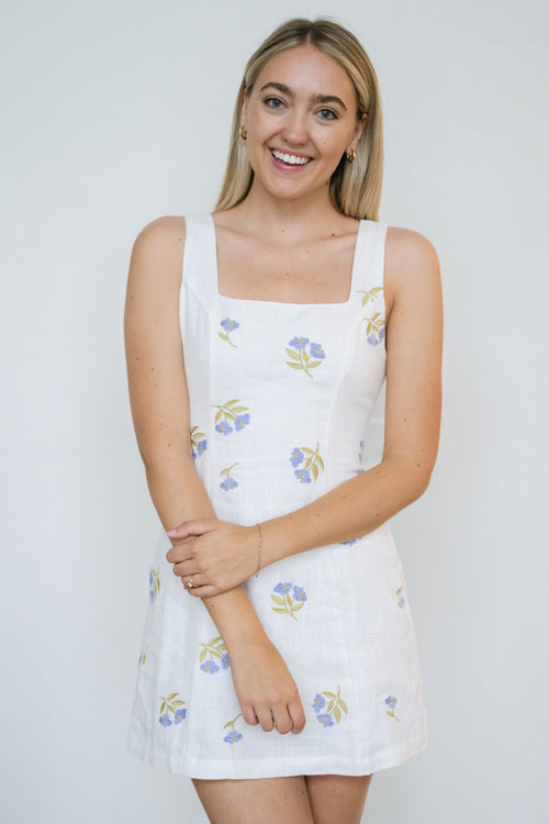 embroidered white mini dress with open back