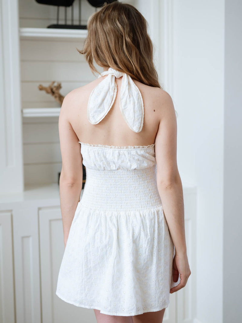 Feminine white mini dress with boho vibes