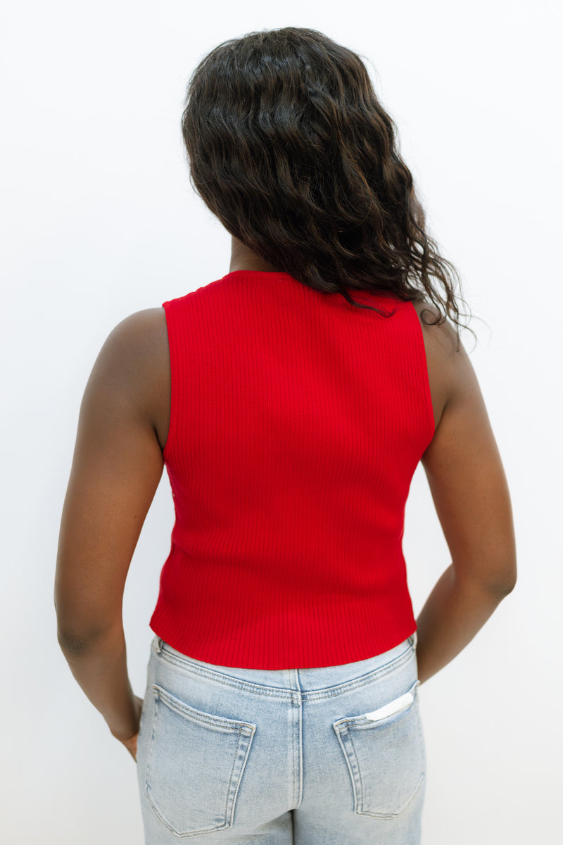 cute red top with satin bow in the front