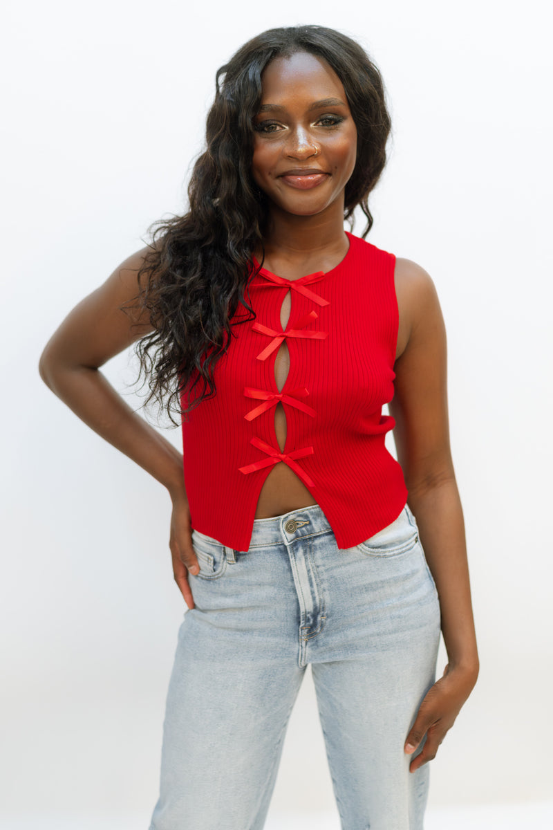 red sleeveless holiday satin bow top