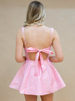 Romantic pink tie back dress