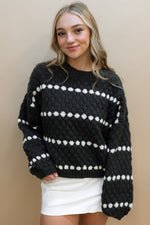 sweater weather knit black sweater with white skort fall outfit