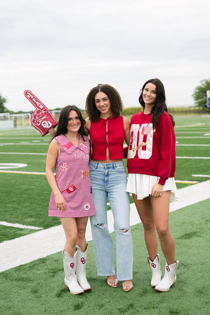 College football red vest bow closures