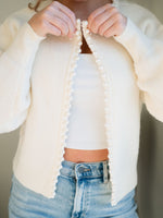 Elegant pearl trim knitwear