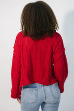 red oversized sweater with cable knit