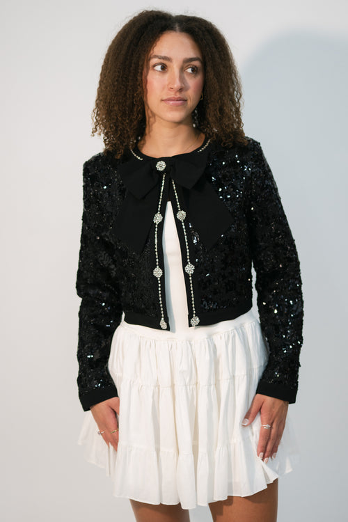 black sequin tweed jacket with bow