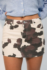 Brown cow print mini skirt denim