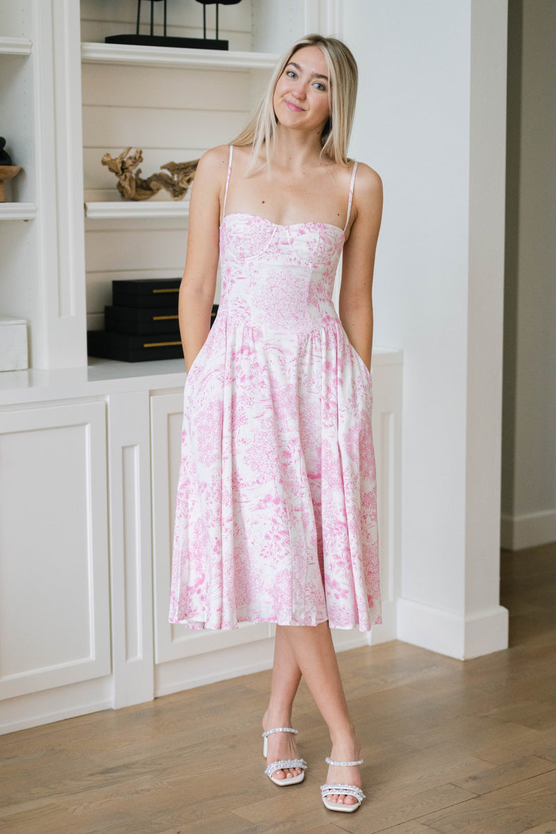 twirl-worthy floral midi for wedding guests