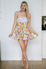 Romantic mixed pattern mini dress garden party outfit whimsical spring fashion