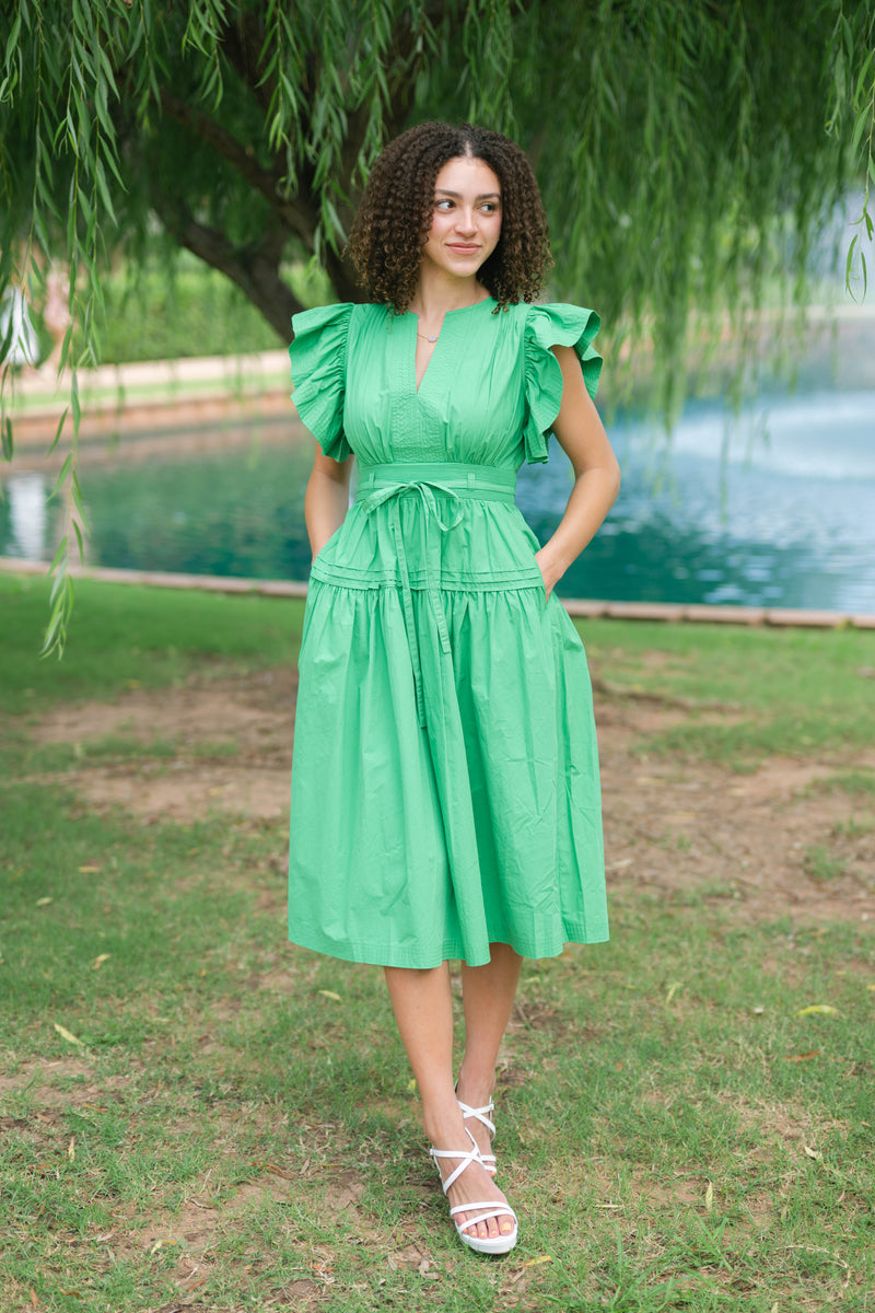 Emerald green dress wedding guest
