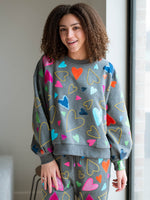 Casual cozy sweatshirt with vibrant hearts design