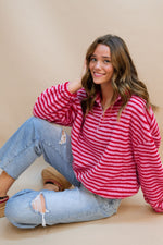 pink and red striped holiday cozy pullover sweater