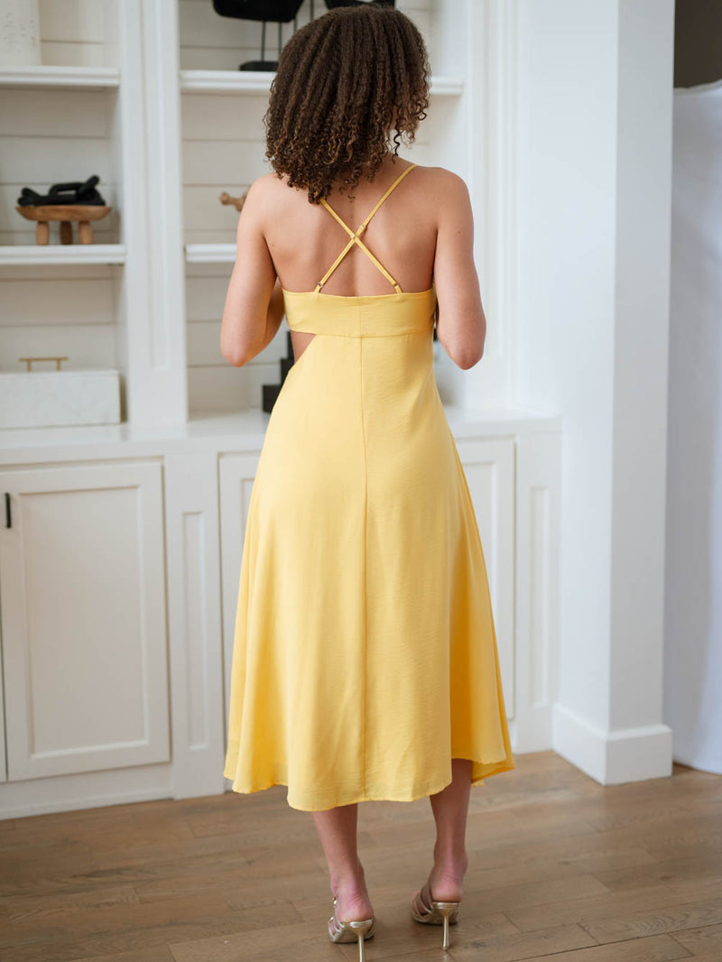 Cross-back yellow cocktail dress