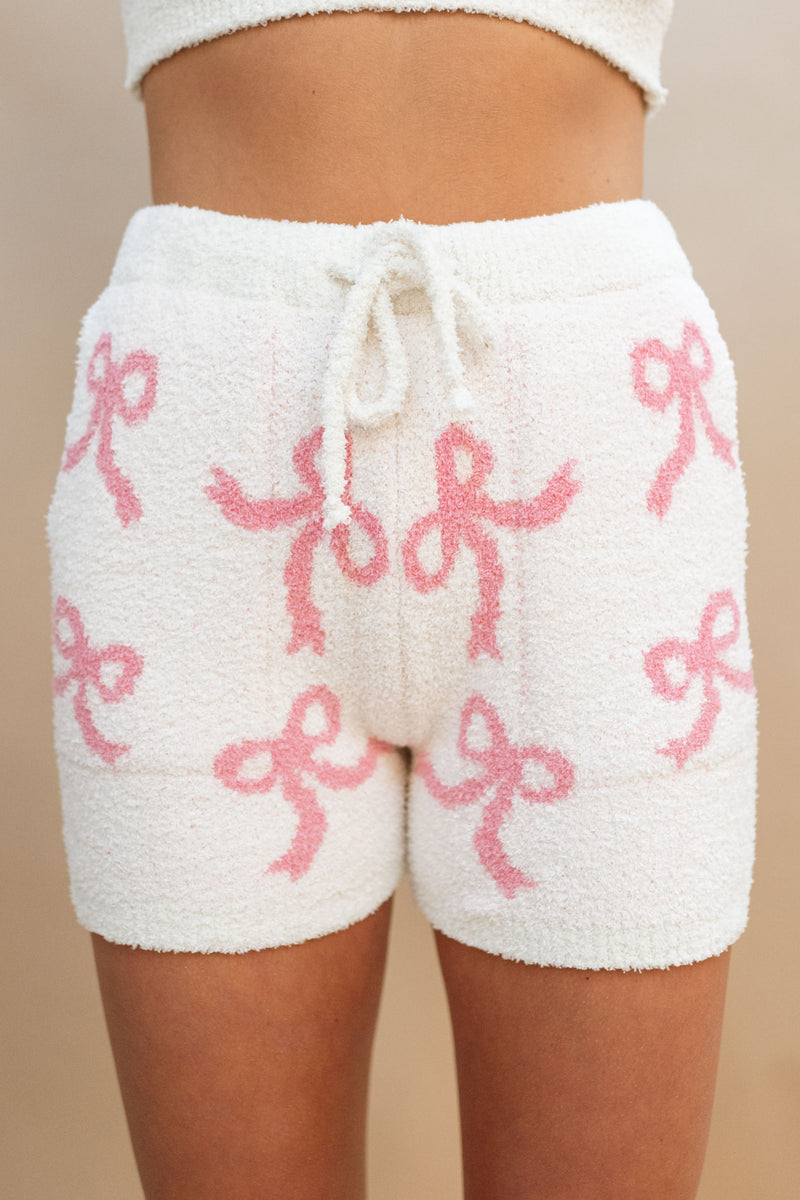 fuzzy pink bow shorts with pockets