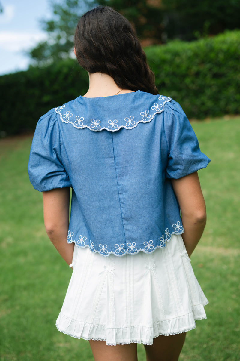 Floral embroidered top bid day