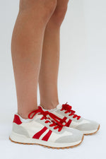 beige red sneakers, red lined sneakers, grey and red sneakers 