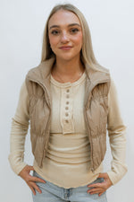 cropped taupe quilted layering piece