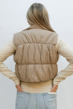 light brown puffer vest