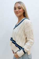 College-inspired style, striped sweater