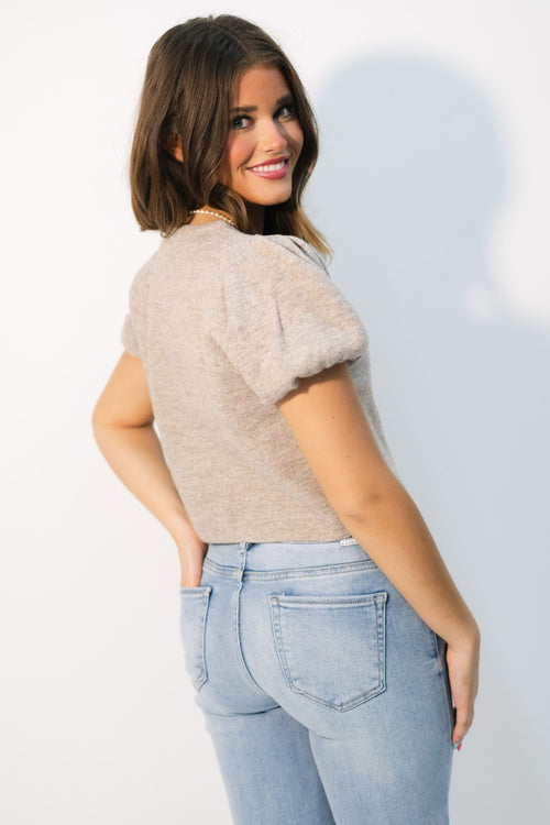 Neutral knit top with puff sleeves
