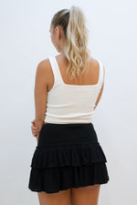 white crop top with square neckline