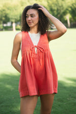Orange denim romper with tie front