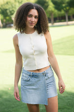 Minimalist cream sleeveless top