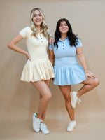 Preppy tennis dress duo in blue and lemon spring collection