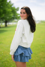 Preppy athleisure USA raw hem cropped top