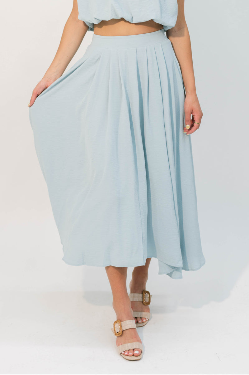 Light blue pleated midi skirt with elastic waist