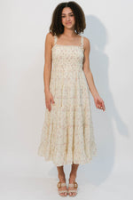Vintage-inspired floral midi with smocked bodice
