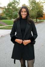 Double-breasted black coat for women