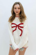 red bow knit sweater